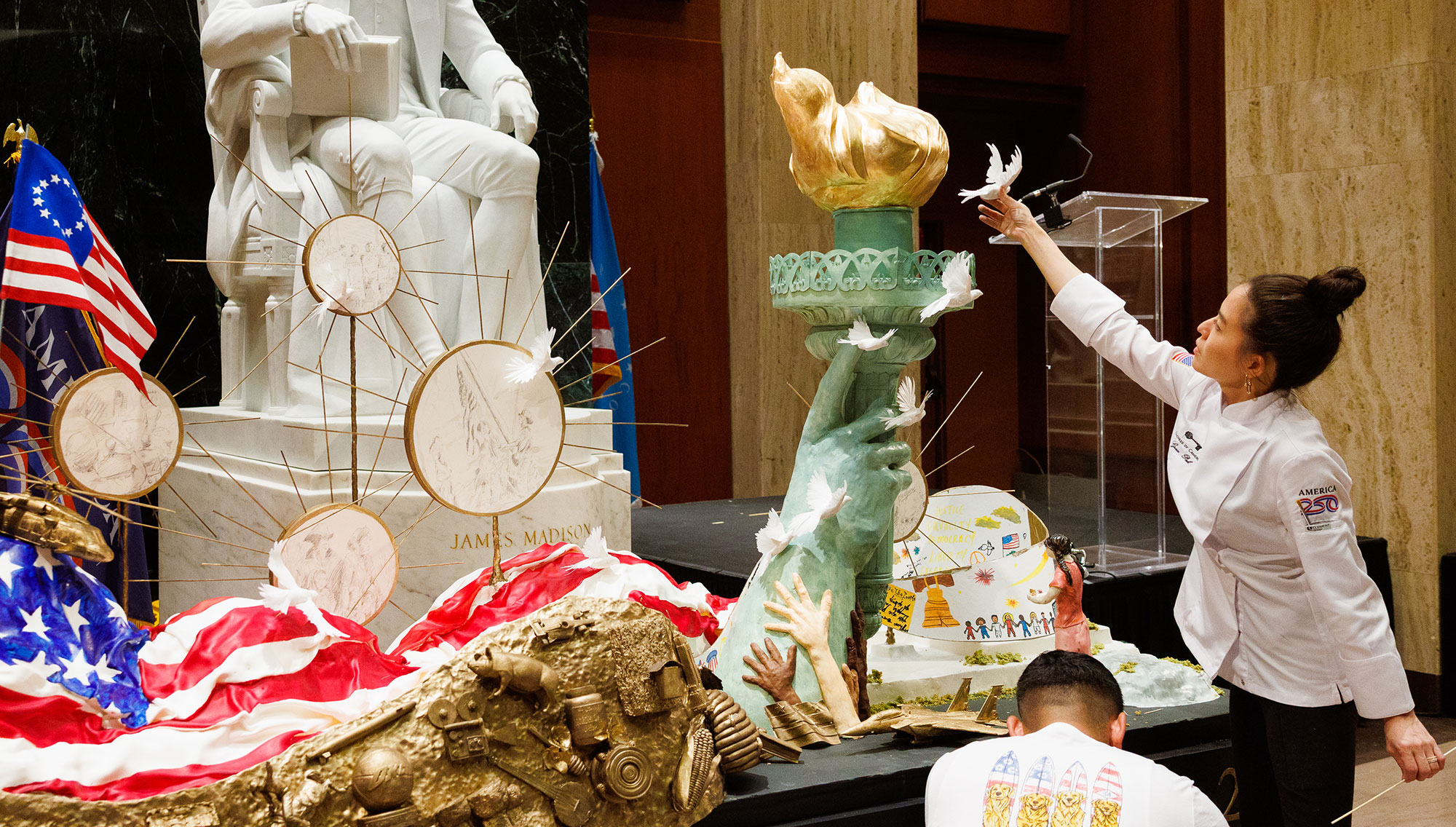 Grace Pak decorates the official America250 cake