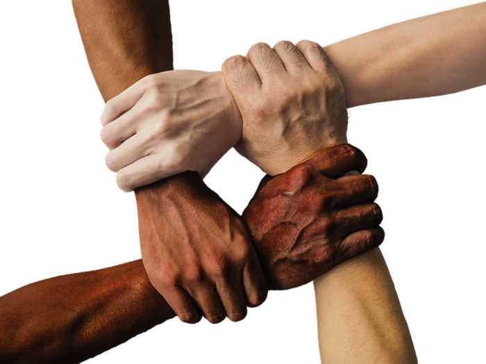 Four hands holding each other