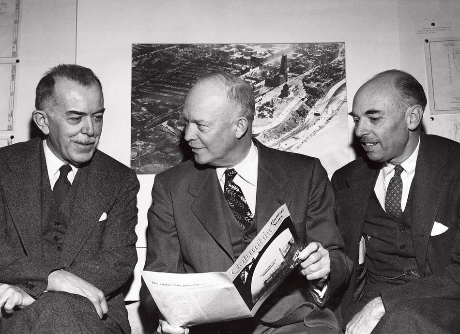 Dwight Eisenhower reading Columbia Alumni News in 1949 with James Kip Finch and Felix E. Wormser