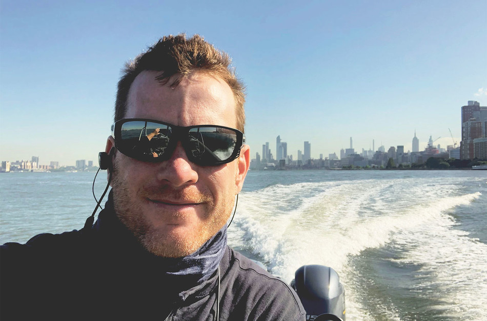 Anthropologist Patrick Nason on a boat in NYC